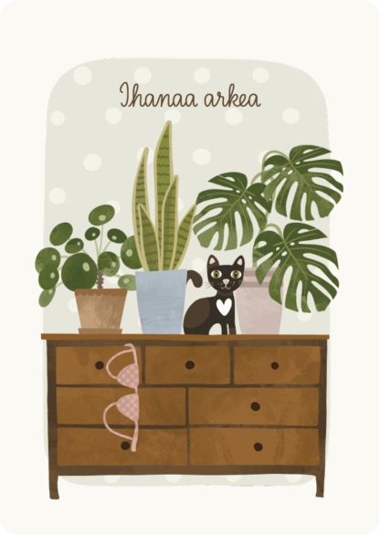 Postikortti jossa viherkasveja ja kissa lipaston päällä. Teksti Ihanaa arkea.